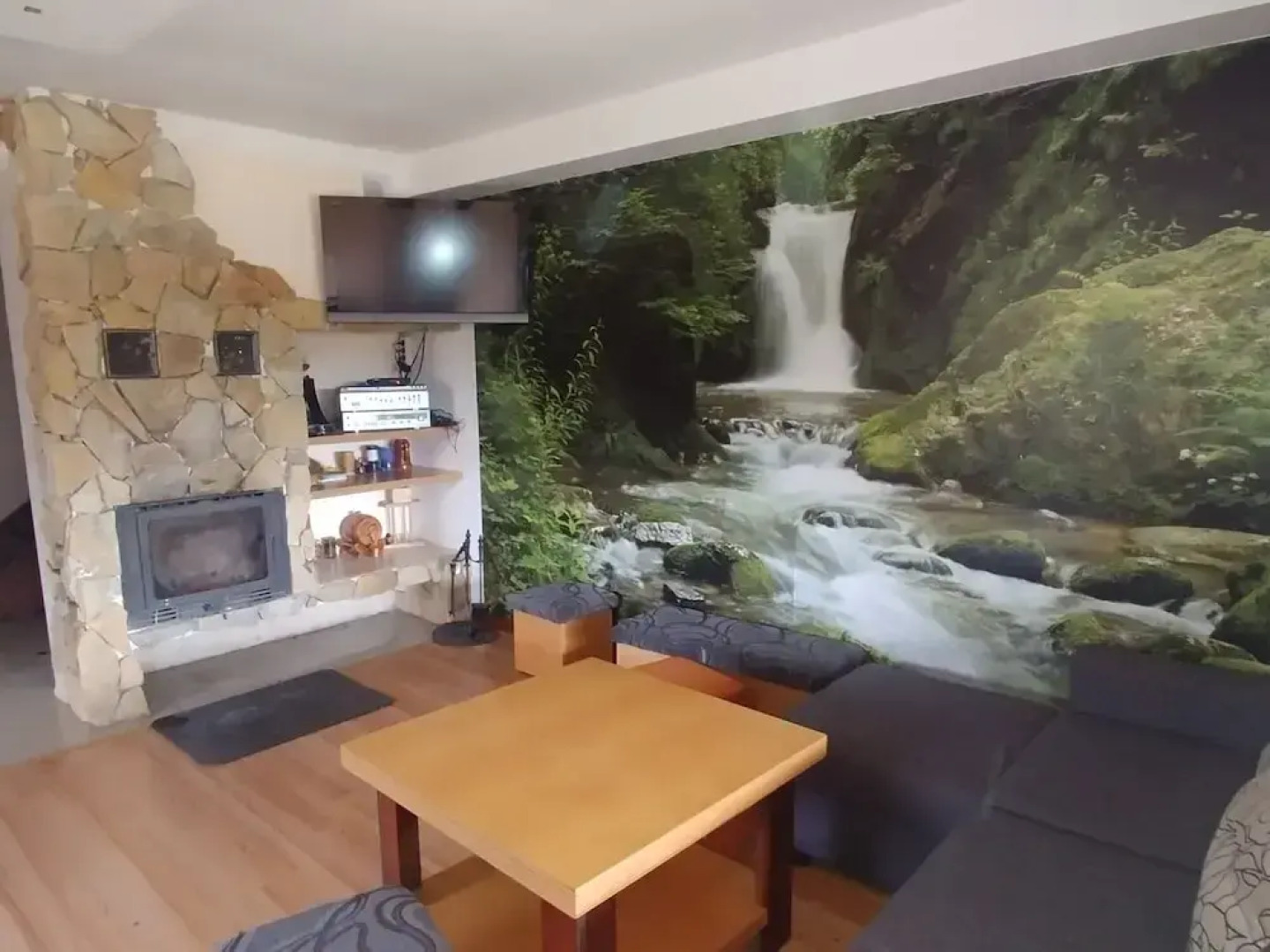 Rustic Riverside Cabin in Forest
