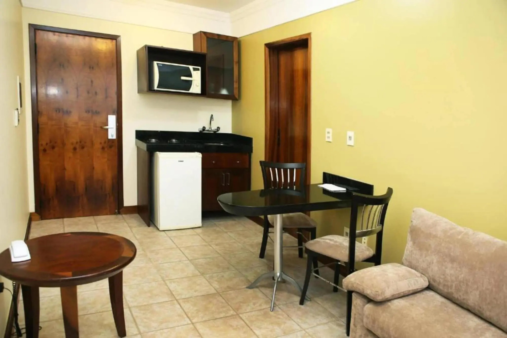 Le Village Flats e Hotel