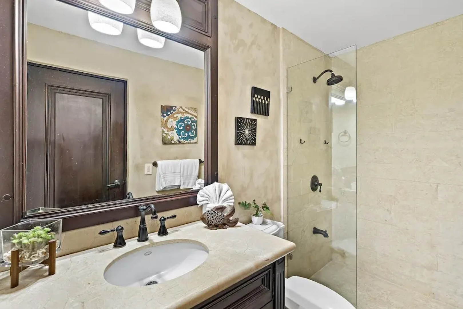 Luxury Beachfront Condo w/ High-End Wood Furnishings and Ocean Views in Exclusive Community