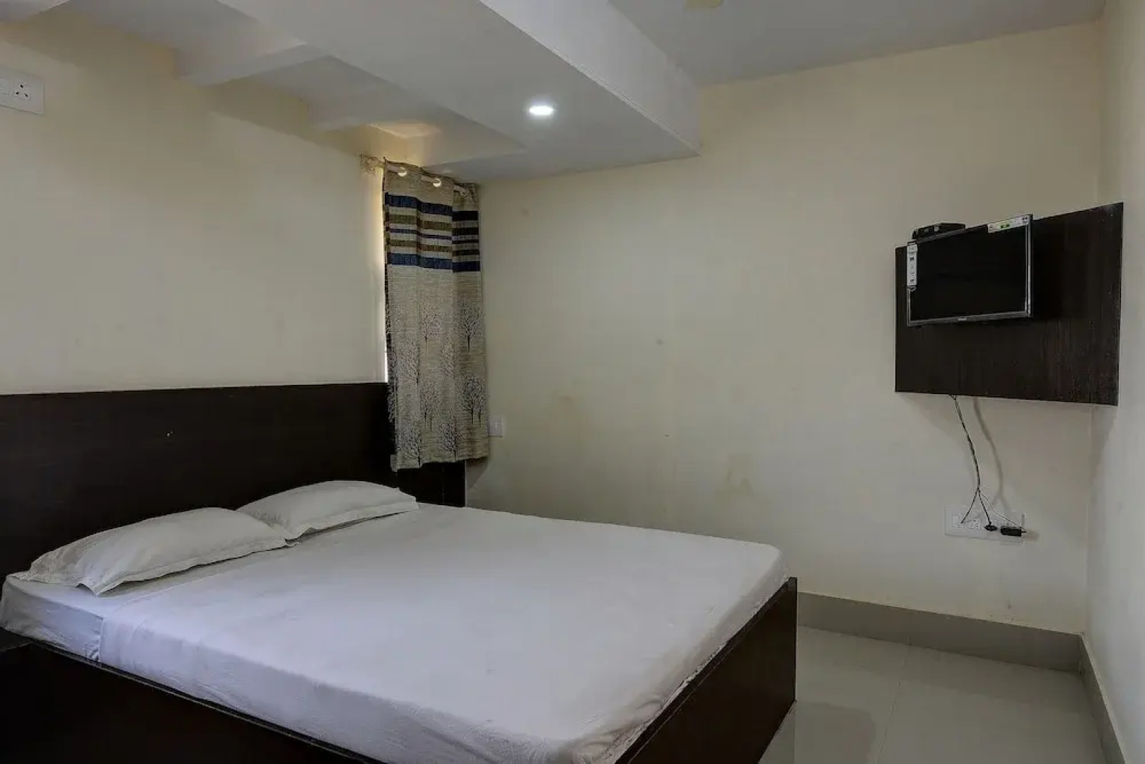 SPOT ON 37153 Karavali Paradise