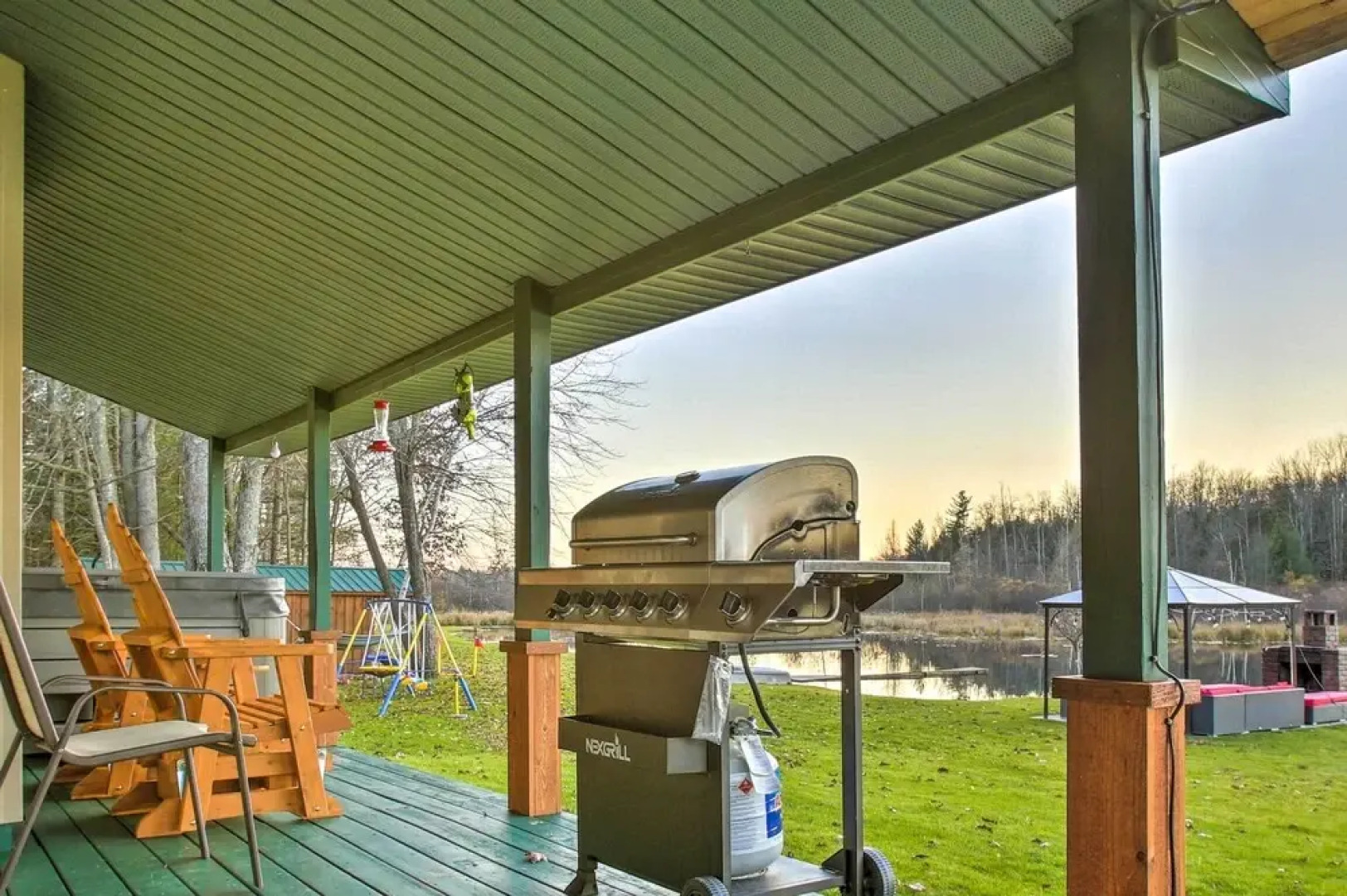 Sun-dappled Cadillac Gem w/ Kayaks & Grill!