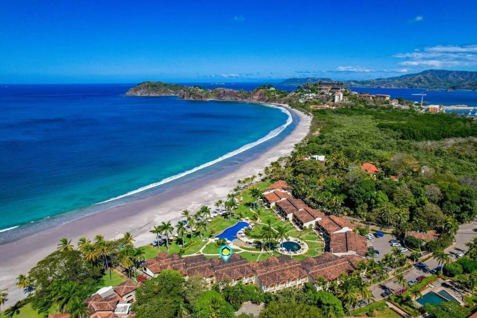 Luxury Beachfront Condo w/ High-End Wood Furnishings and Ocean Views in Exclusive Community
