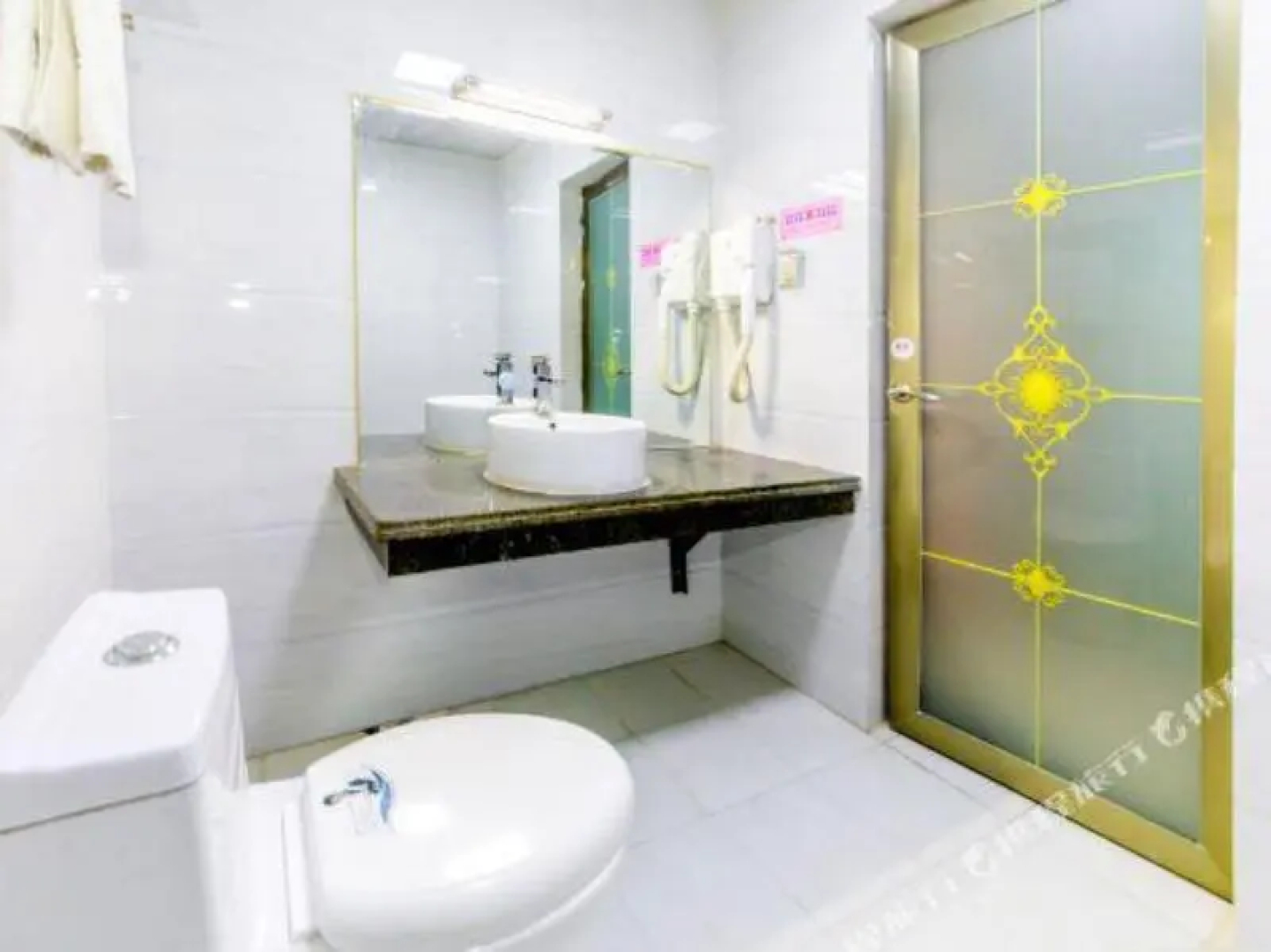 Kuqa Xinyu Hotel (Guiz Plaza)