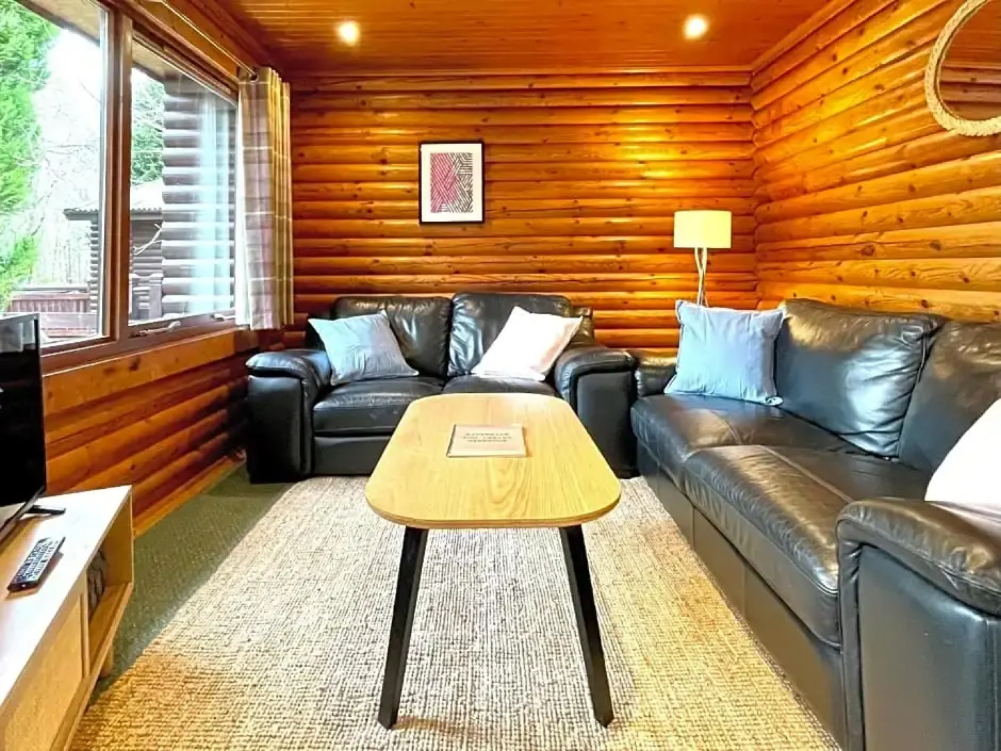 Riverside log cabins