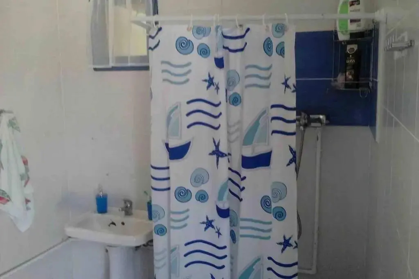 Wooden beach house / Nea Roda, Halkidiki