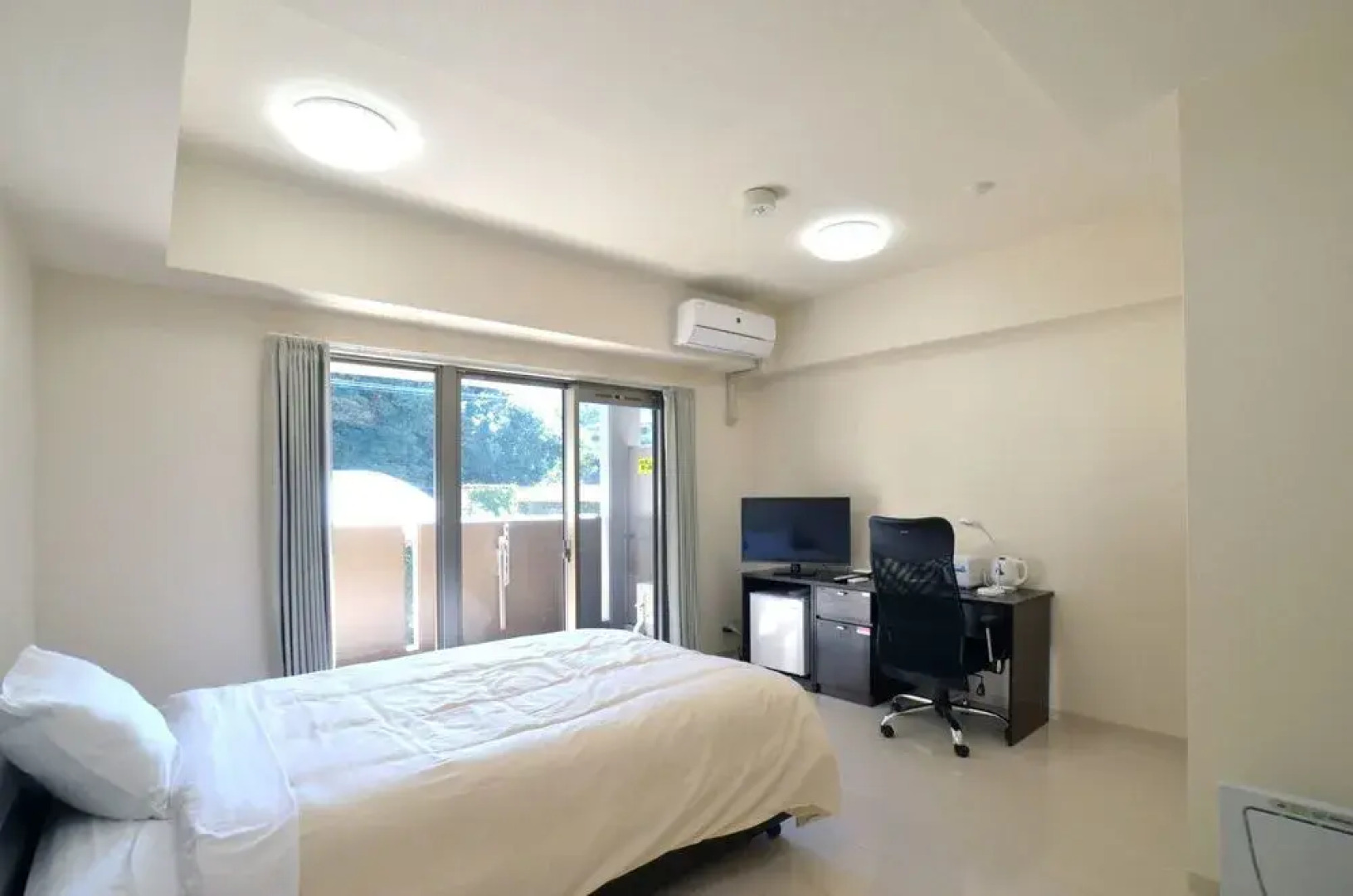 New Station Hotel Residence