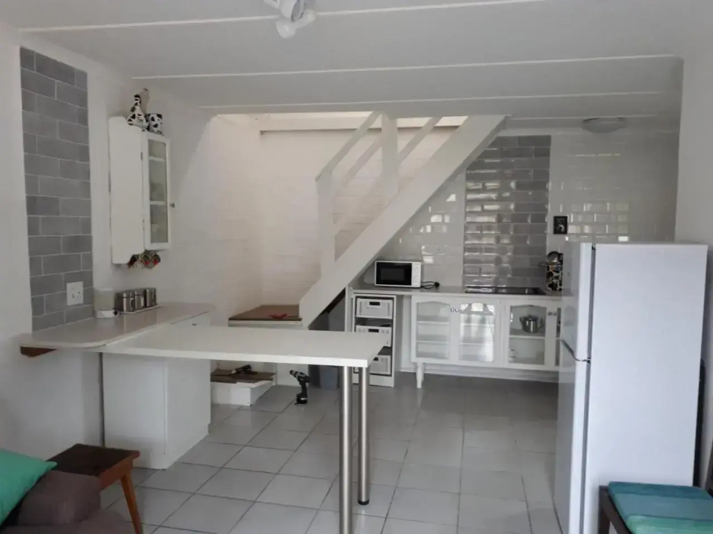 Cozy 4 bedroom house enclosed by sea and mountain.