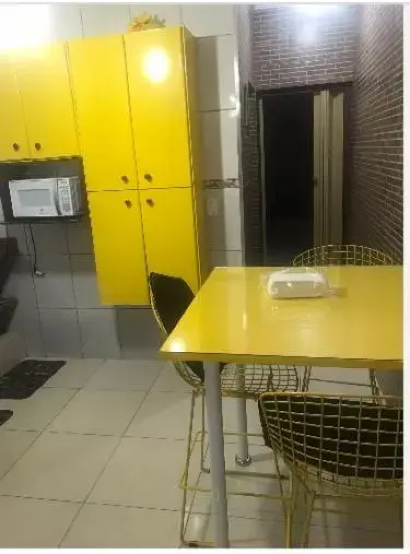 Casa com piscina próxima à cachoeira