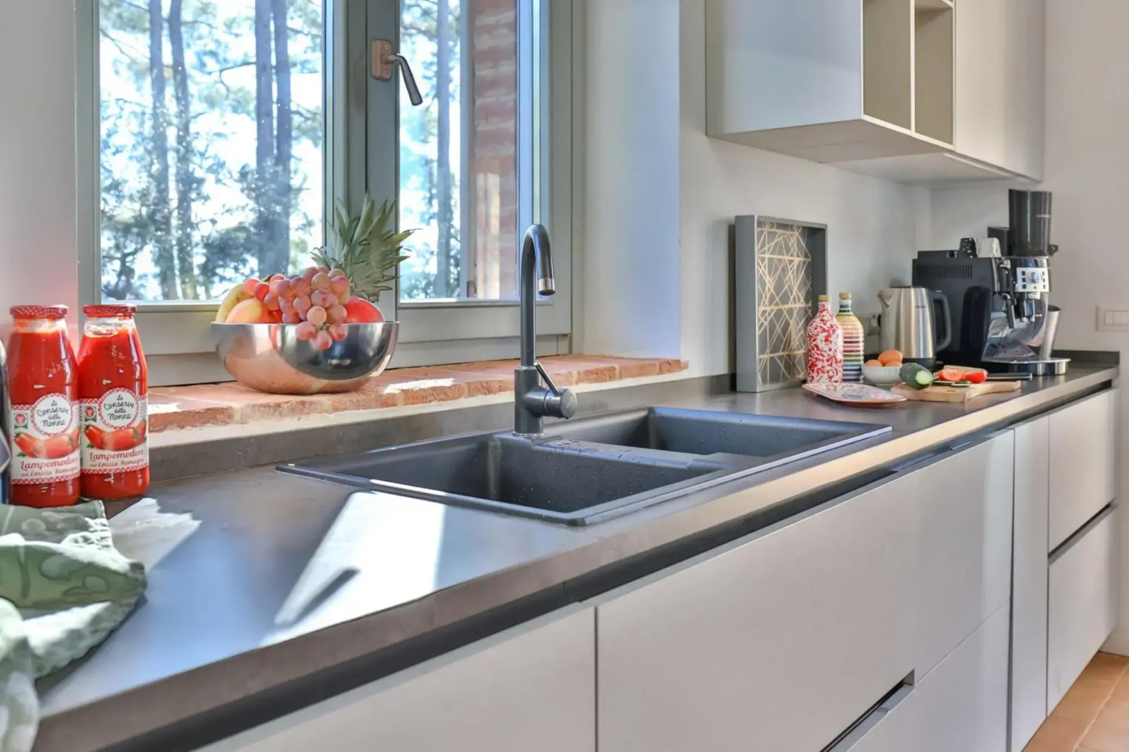 In an enchanting position, located on a hill, Podere Calcina is a recently completely renovated farm-Podere Calcina