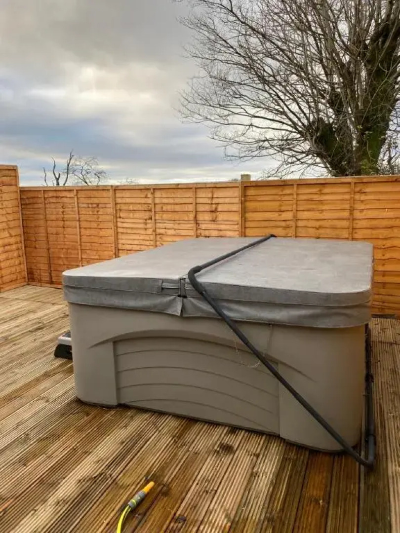 Coachman Cottage Outside Hot Tub