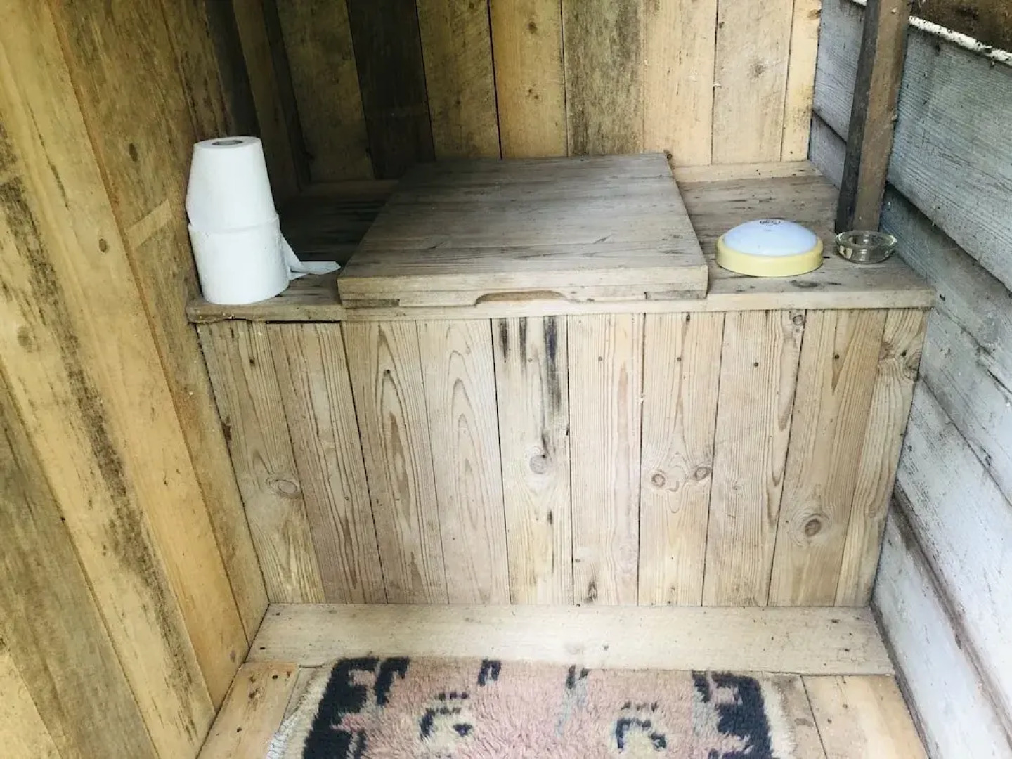 Tiny hut in the Forest Overlooking the River