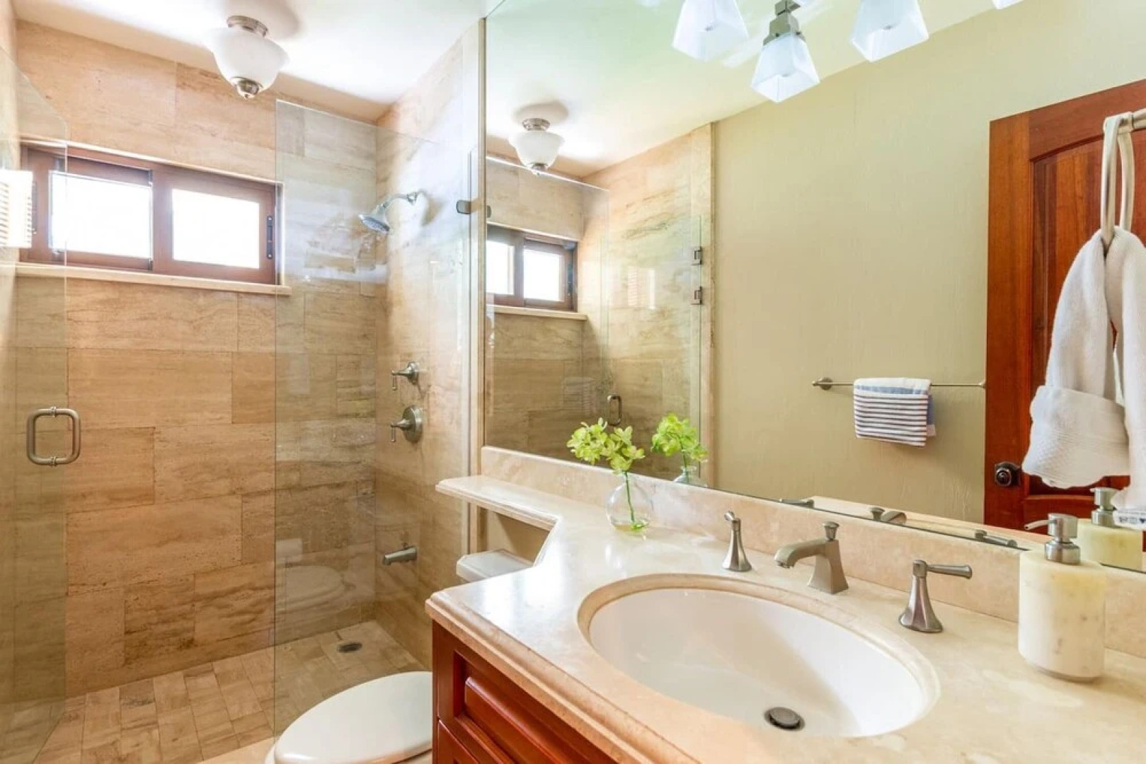 Modern Oceanfront Condo with a Chic Coastal Design, Resort-Style Amenities, and Direct Beach Access