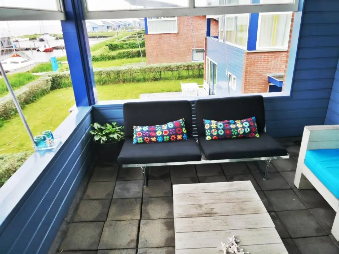 6pers Modern harbor house Jasmijn with fenced garden and lake view