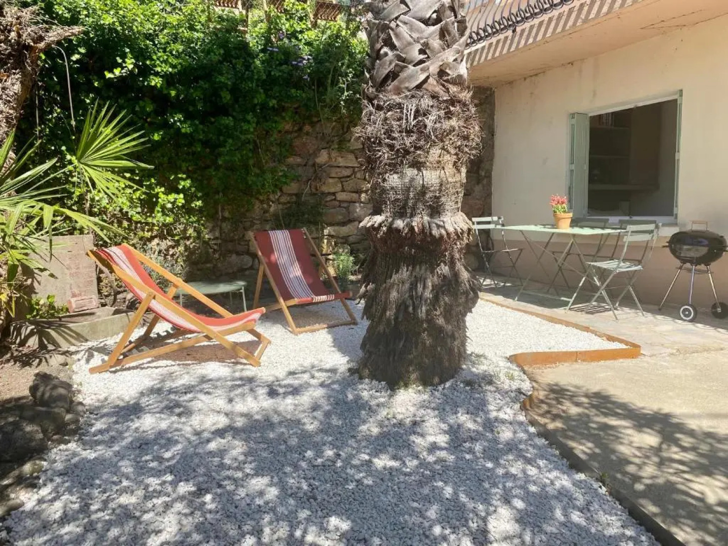 Gîte Le Palmier - Perfectly located cosy studio with private garden