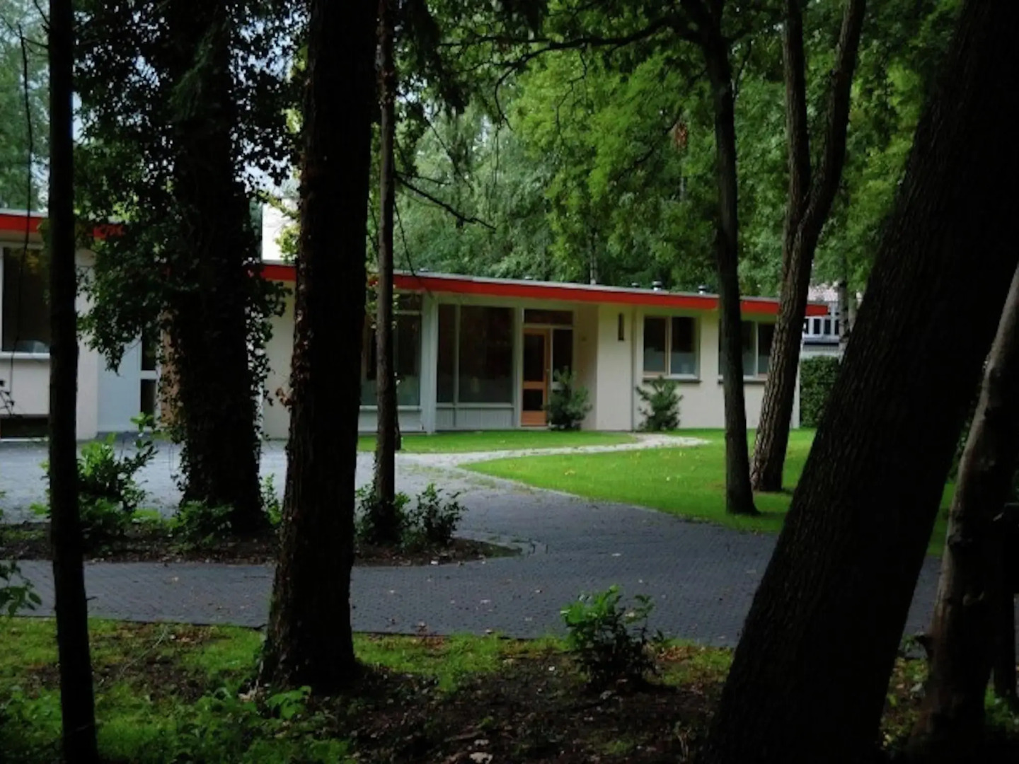 Cozy decorated house with fireplace, surrounded by forest