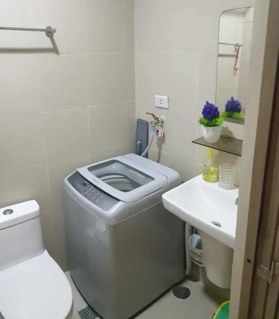 Cozy 1BR with balcony at Fame Residences