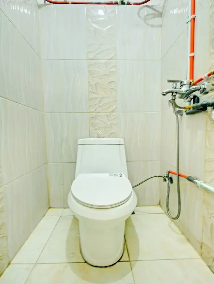 OYO 90307 Fj Alfaeyza Kost