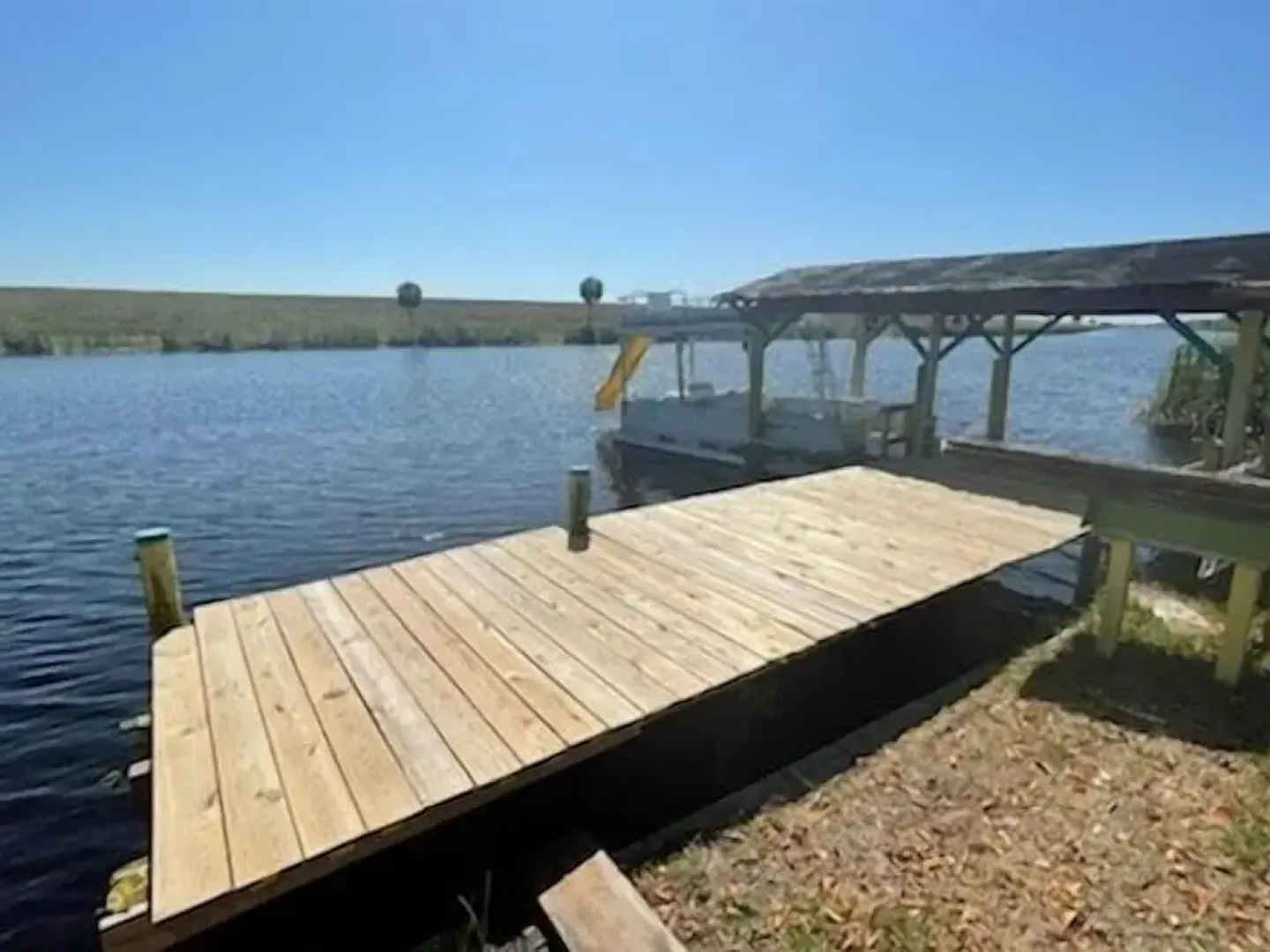 Rim Canal 'yellow House' With Canal Views & Boat Dock 1 Bedroom Cottage by RedAwning