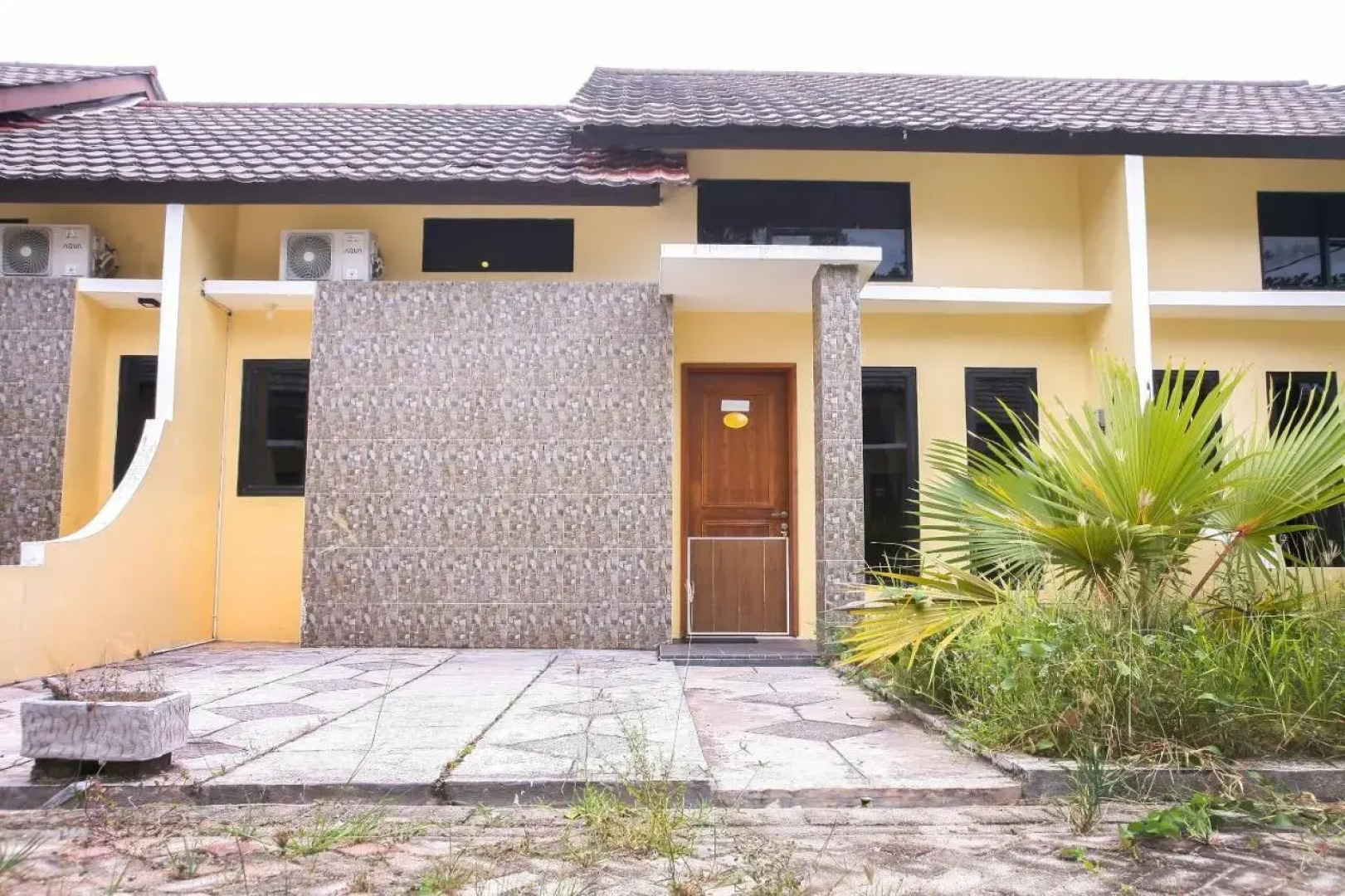 Pasir Padi Inn Syariah  by OYO Rooms