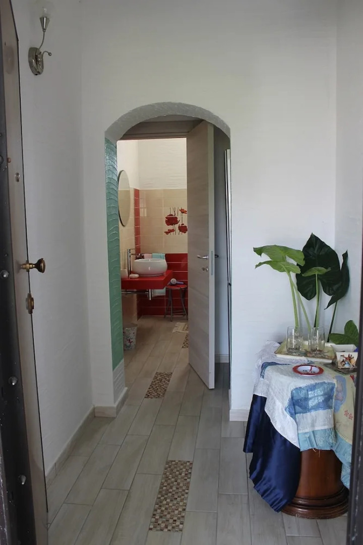 Room in Guest Room - S'olivariu Village Affittacamere - King Room With Roll-in Shower