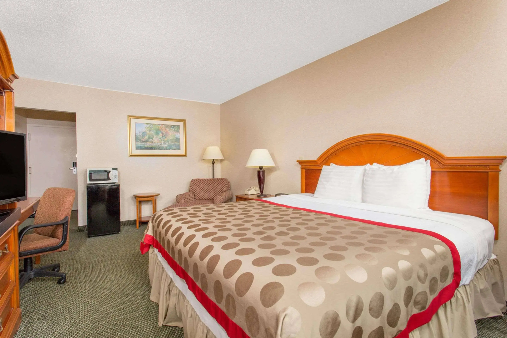 HomeTowne Studios by Red Roof Painted Post