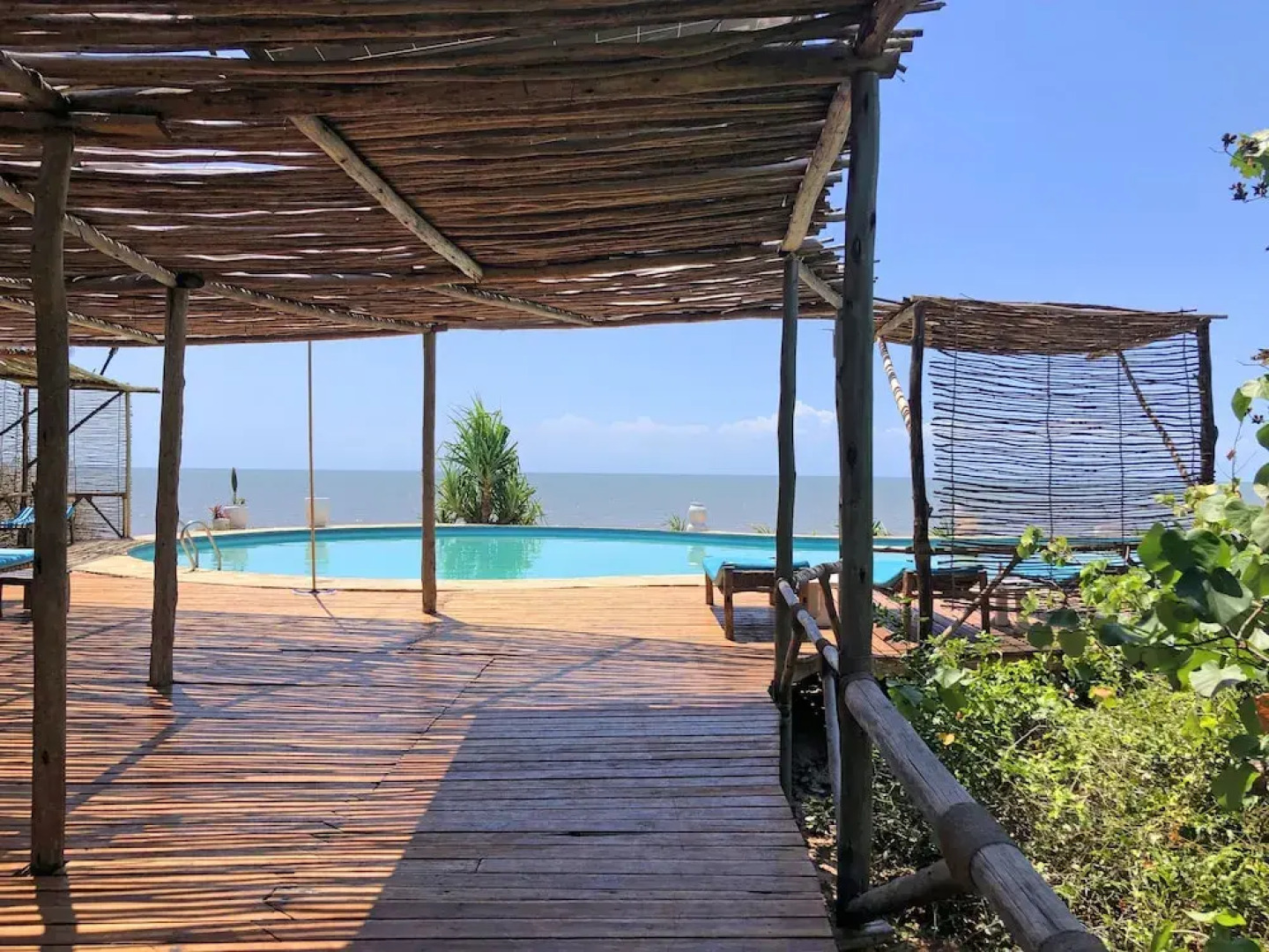 Saadani Safari Lodge - bush, river, beach