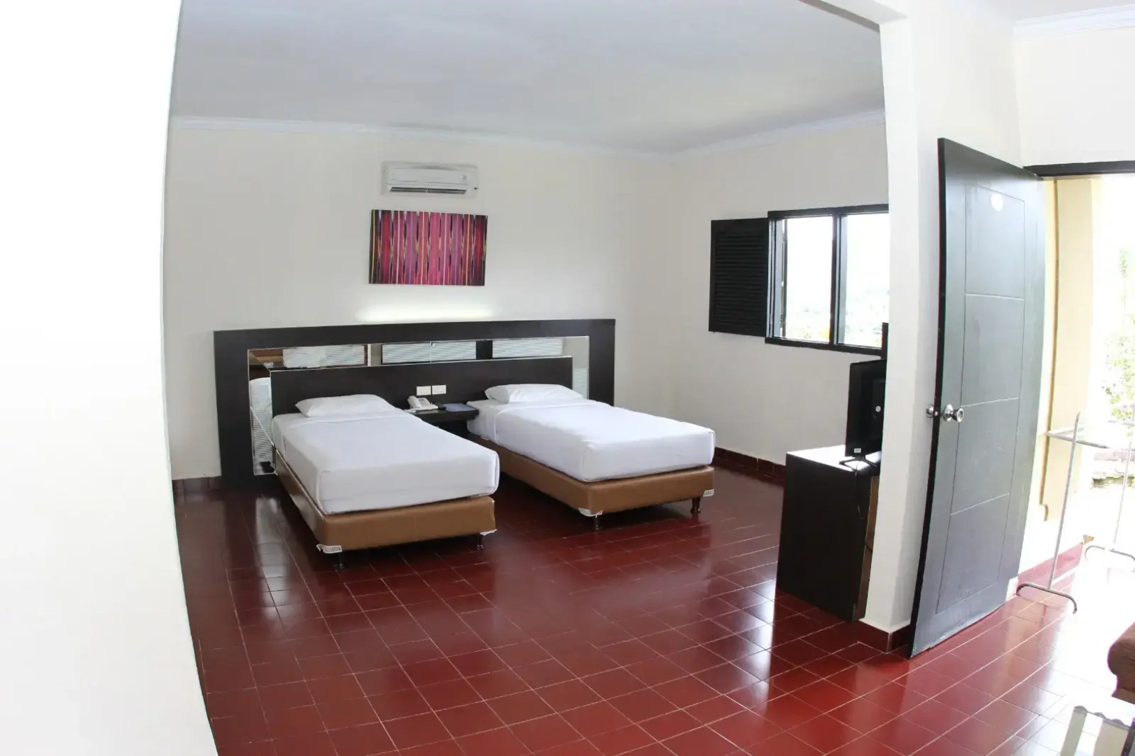 Danau Toba International Cottage