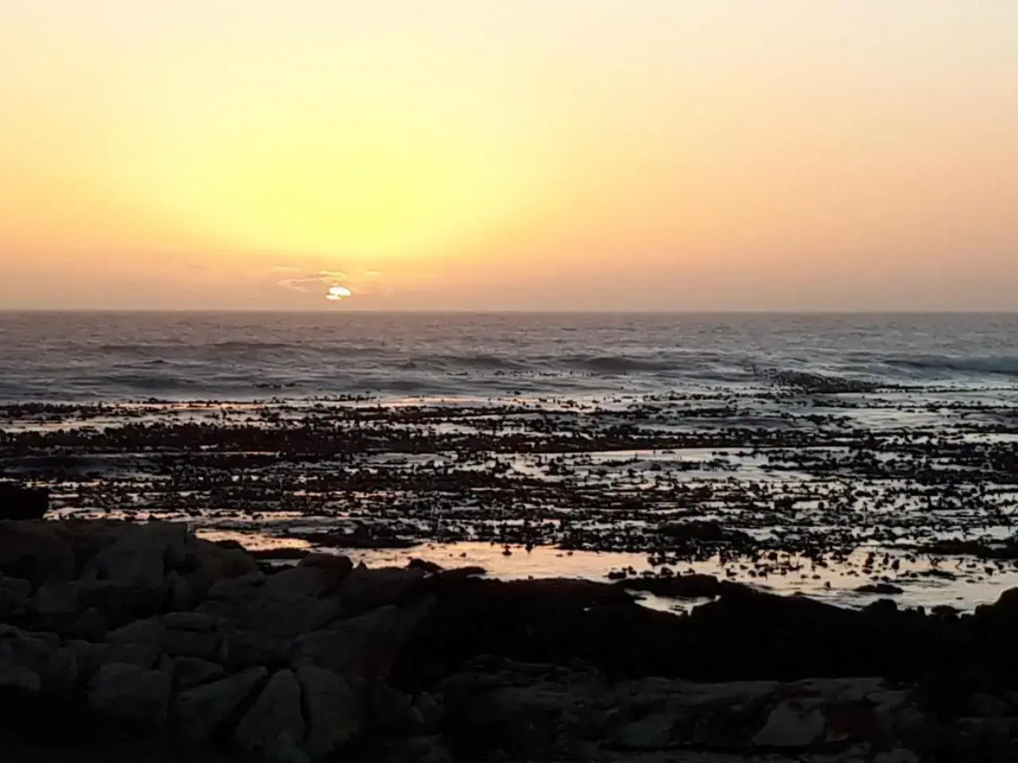 Cozy 4 bedroom house enclosed by sea and mountain.