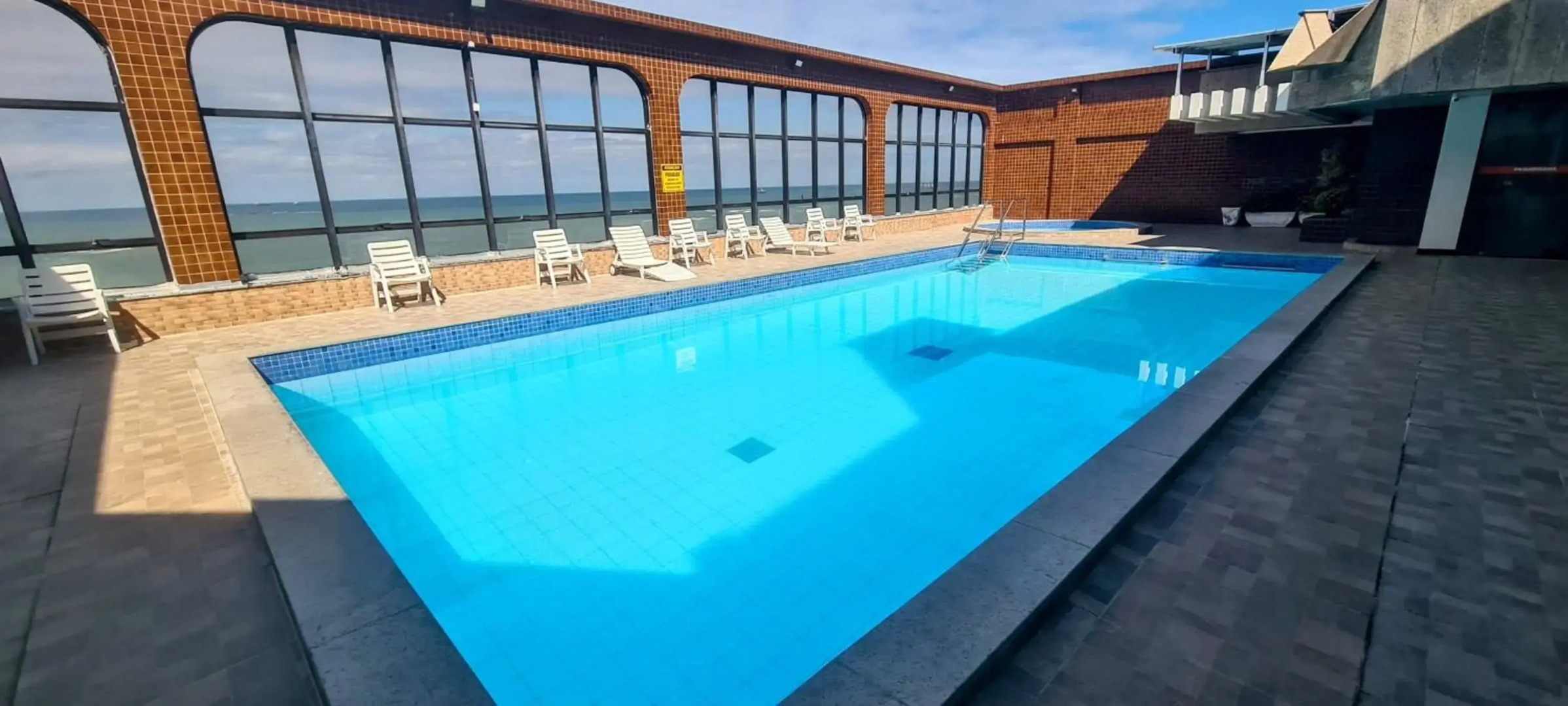 Flat Pasárgada 812, Free Bikes, pé na praia