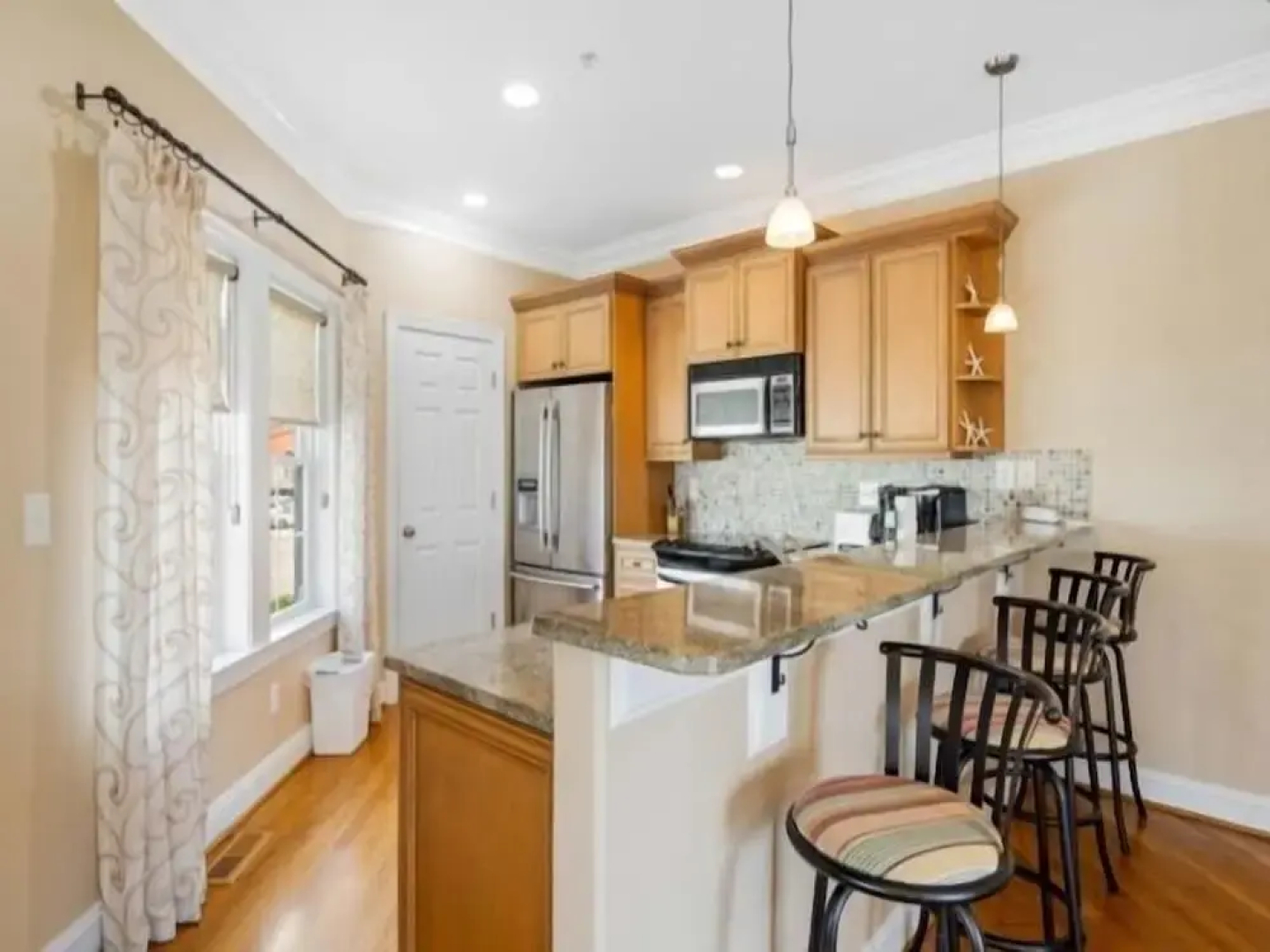 Kure Beach Villa - Enjoy Three Levels Of Luxury! Outdoor Pool And Garage Parking! 2 Bedroom Townhouse by RedAwning