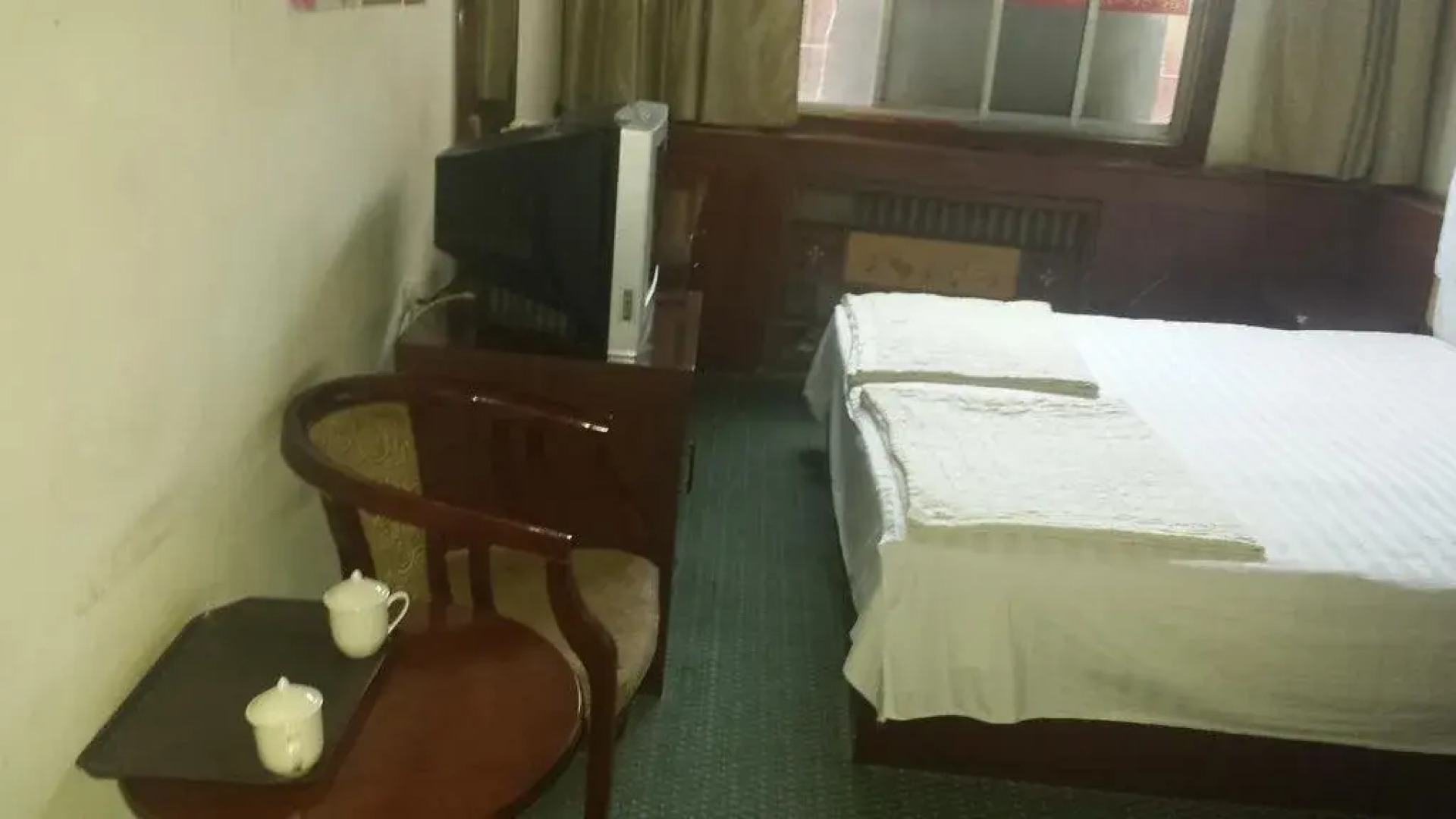 Xinmi Wanjiale Hotel