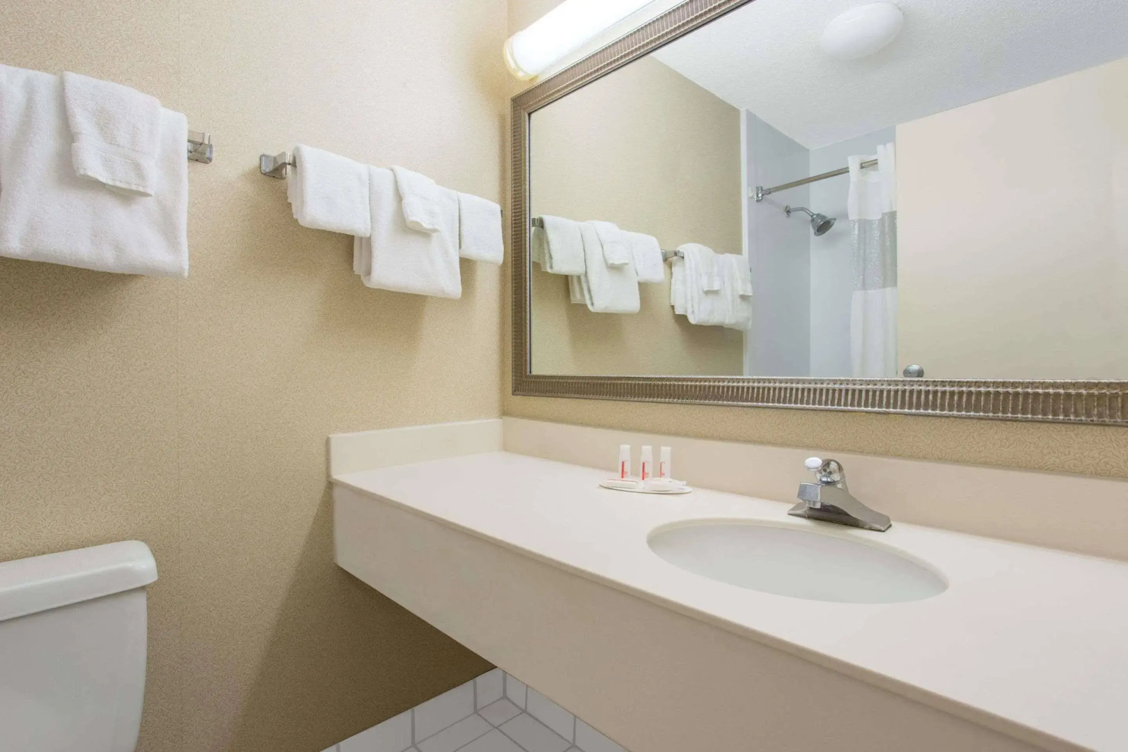 HomeTowne Studios by Red Roof Painted Post