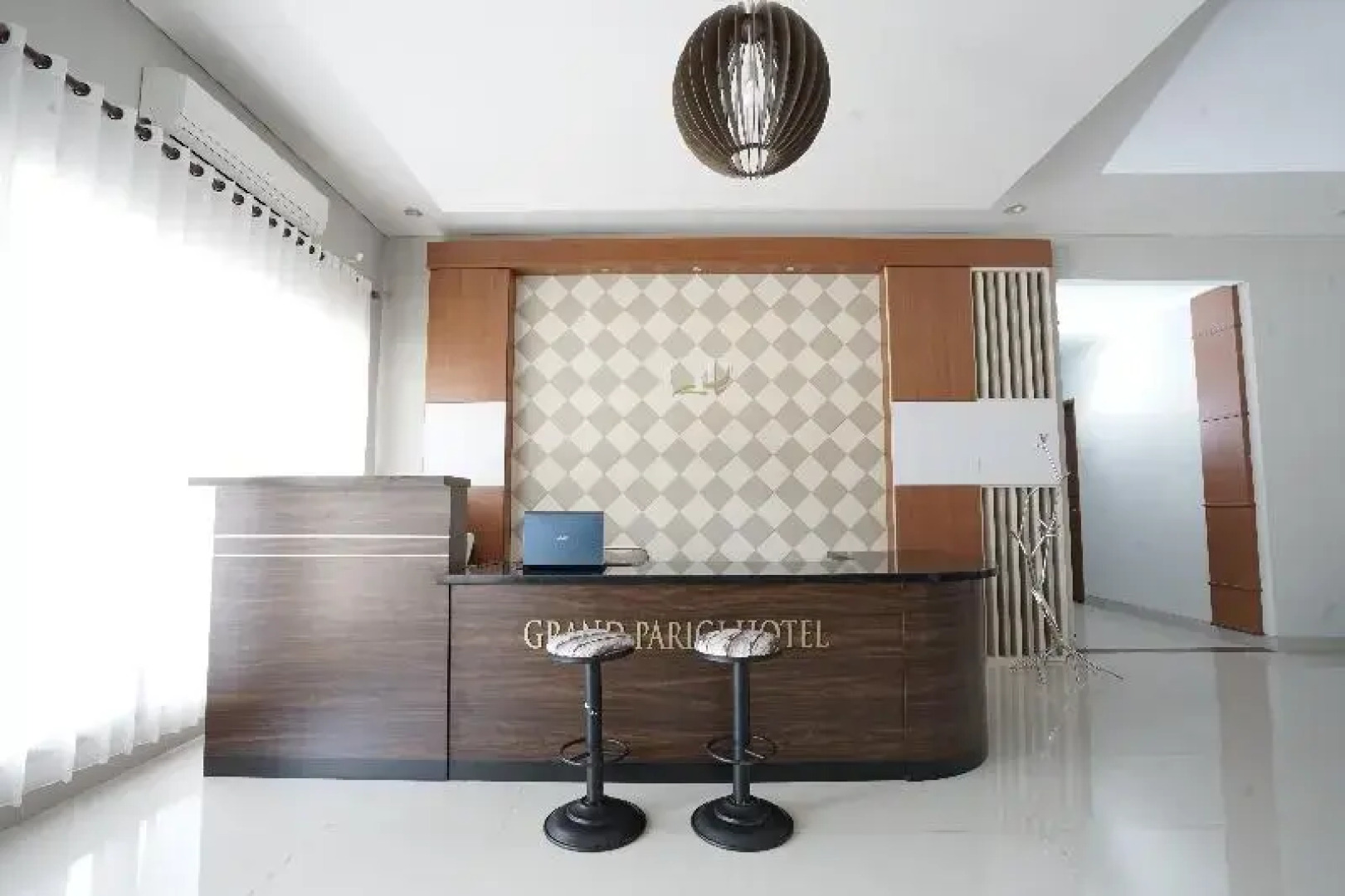 Capital O 1974 Grand Parigi Hotel