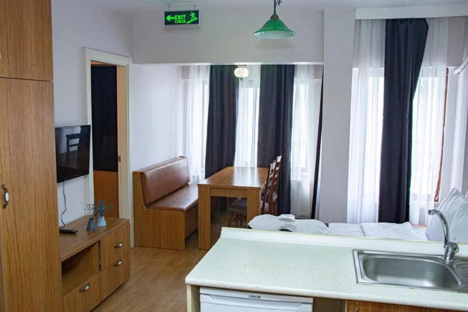 Three Apples Suites and Hotel