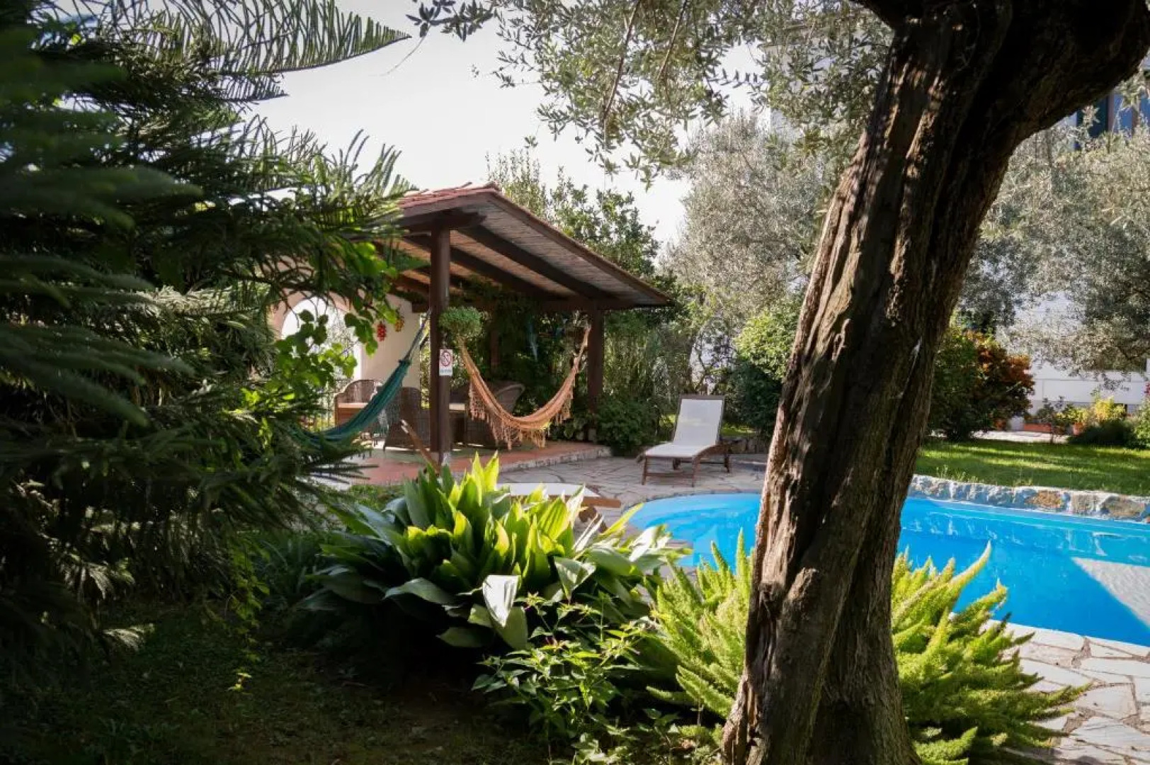 Appartamento in Villa con Giardino privato e piscina