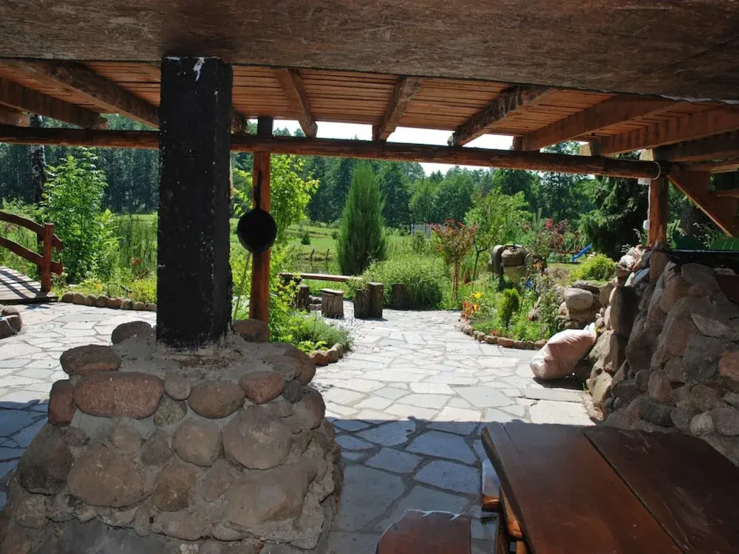 Rustic Riverside Cabin in Forest