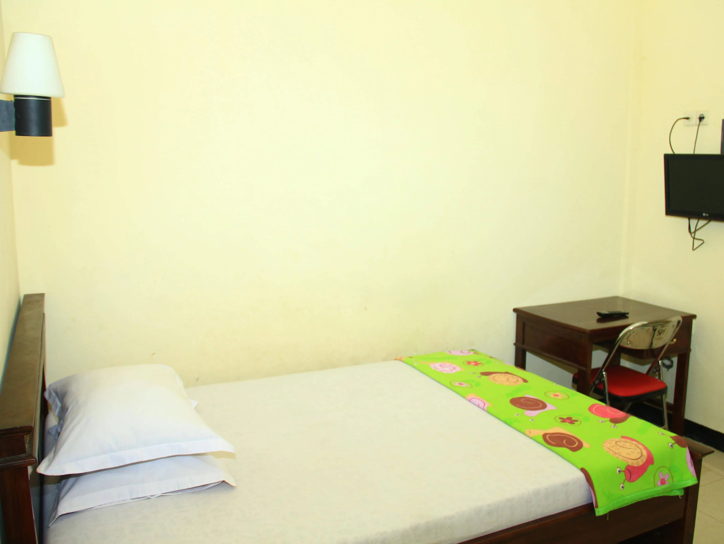 OYO 587 Penginapan Sinar Harapan