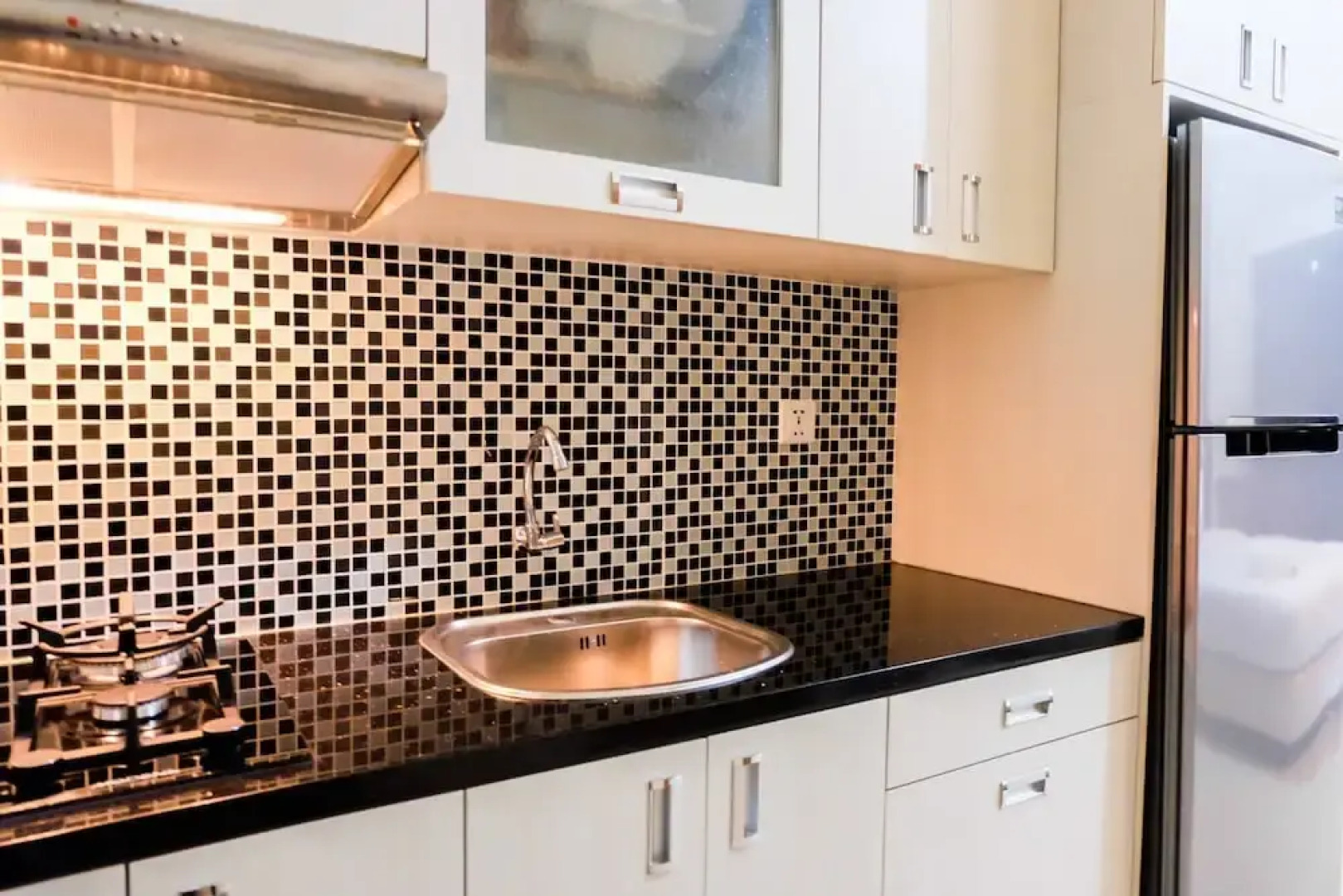 Warm and Homey Studio at The Oasis Cikarang Apartment By Travelio