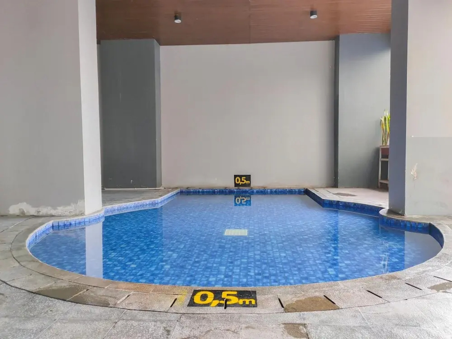 Minimalist Tamansari Mahogany Studio Apartment with City View