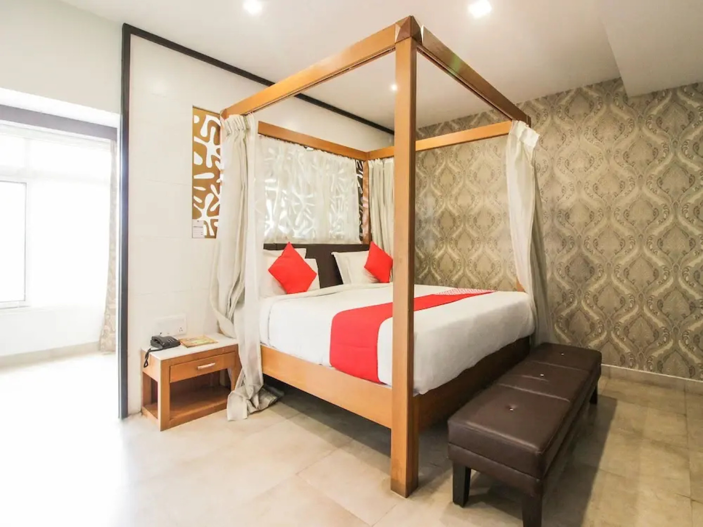 Capital O 15964 NI Ambaari Suites