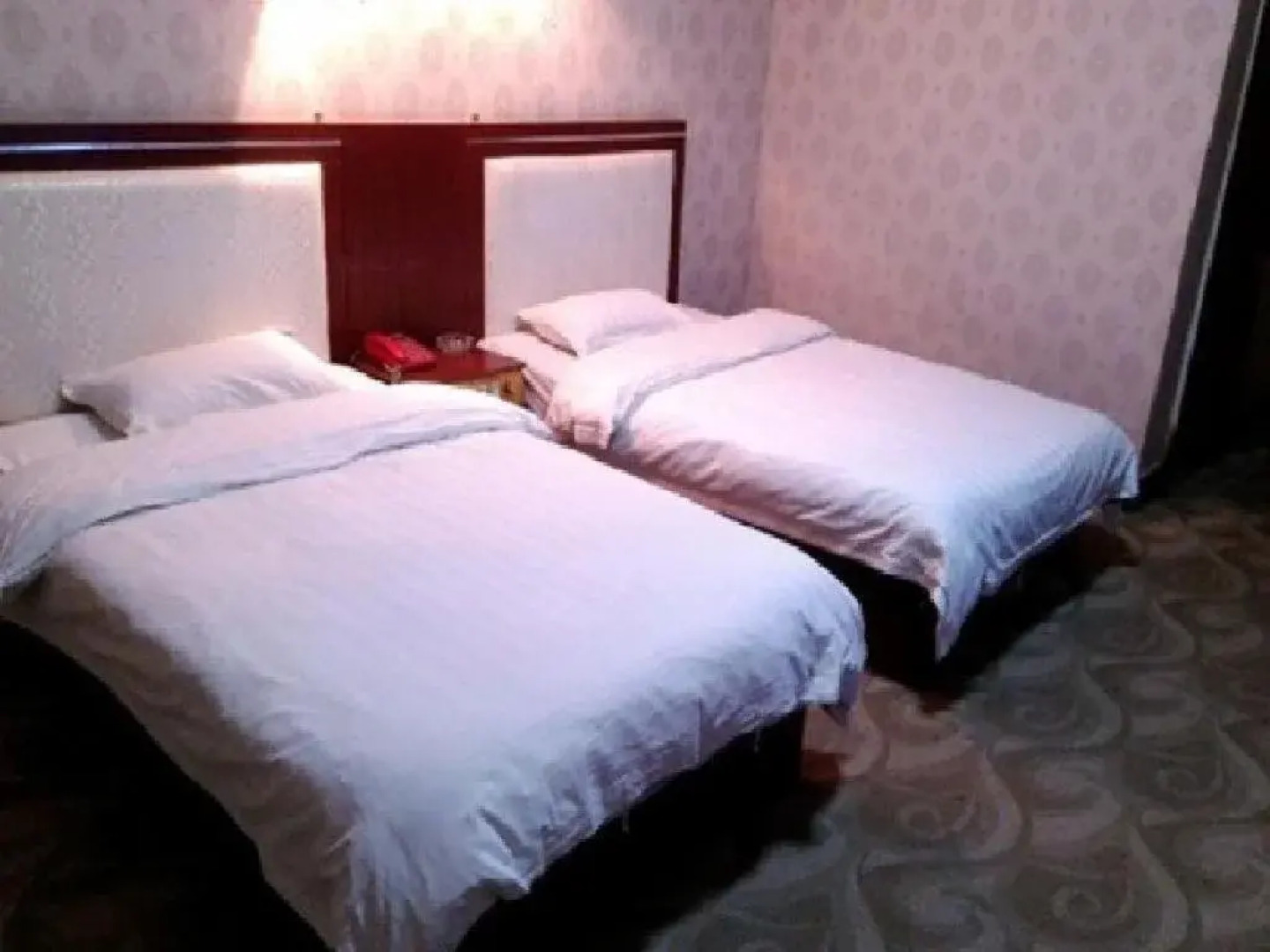 Luo Chuan Guo Hao Business Inn