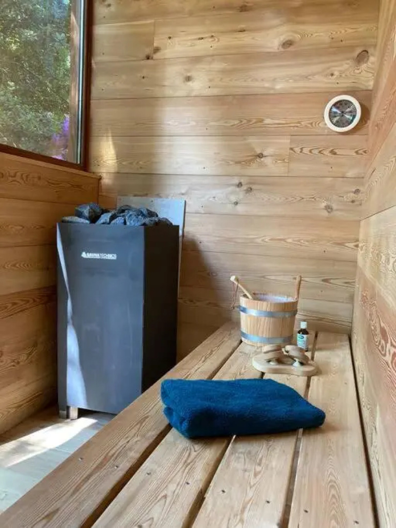 Houten bosvilla met sauna en 2 slaapkamers