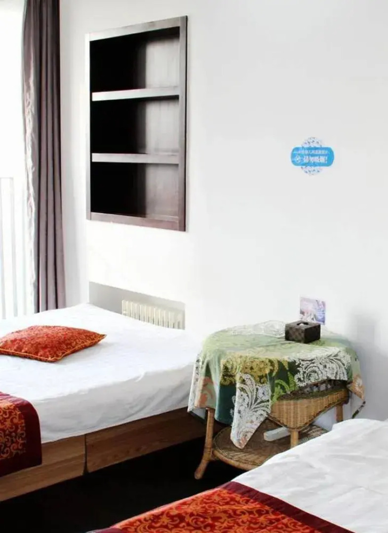 Enji Apartment Hotel Bainianhui - Dalian