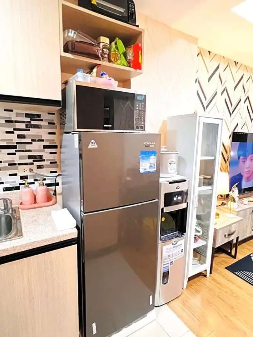 New Cozy 2 bedroom unit condotel for staycation with living room and kitchen set with pool
