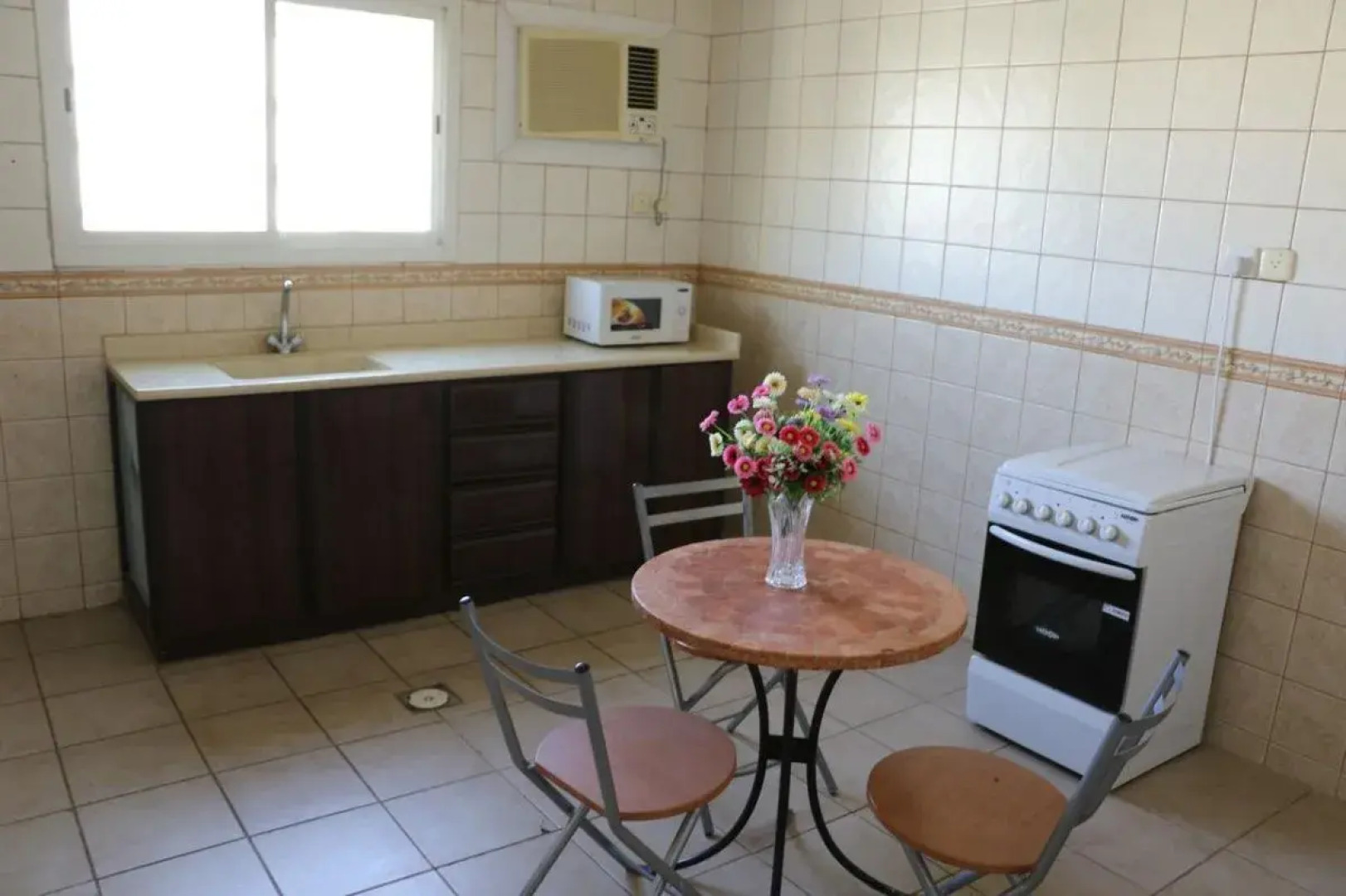 Al Alya Hotel Rooms and Suites