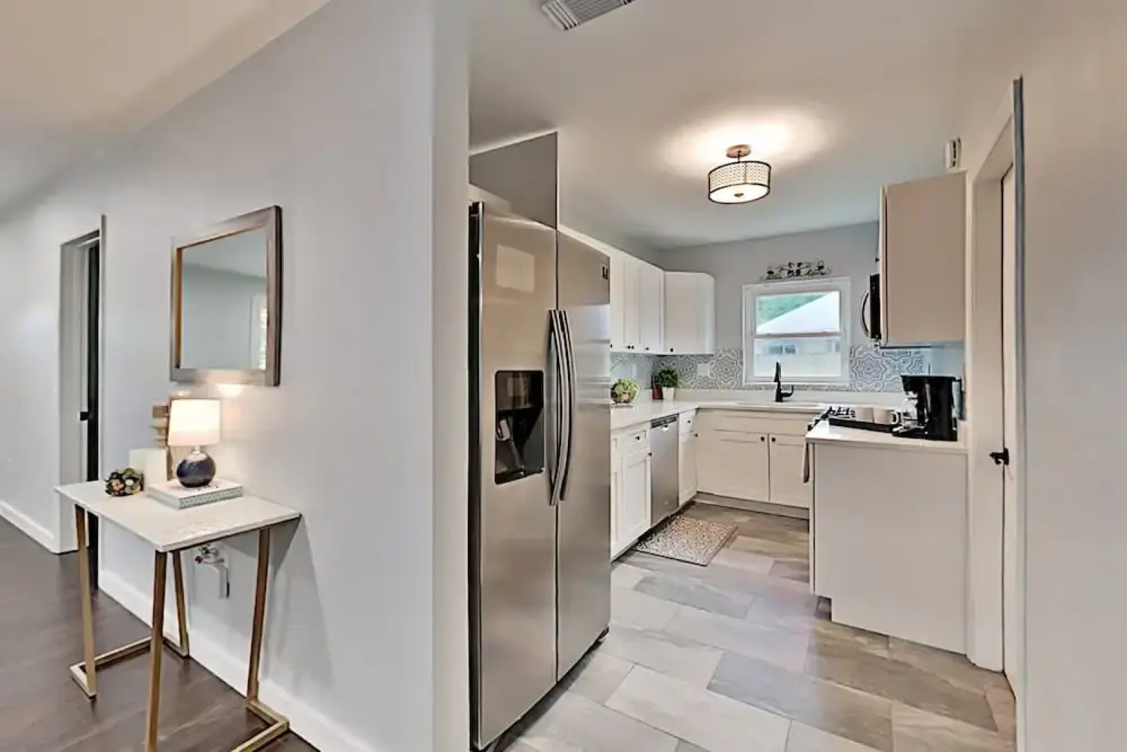 Charming Getaway W/ New Kitchen & Private Backyard 3 Bedroom Home