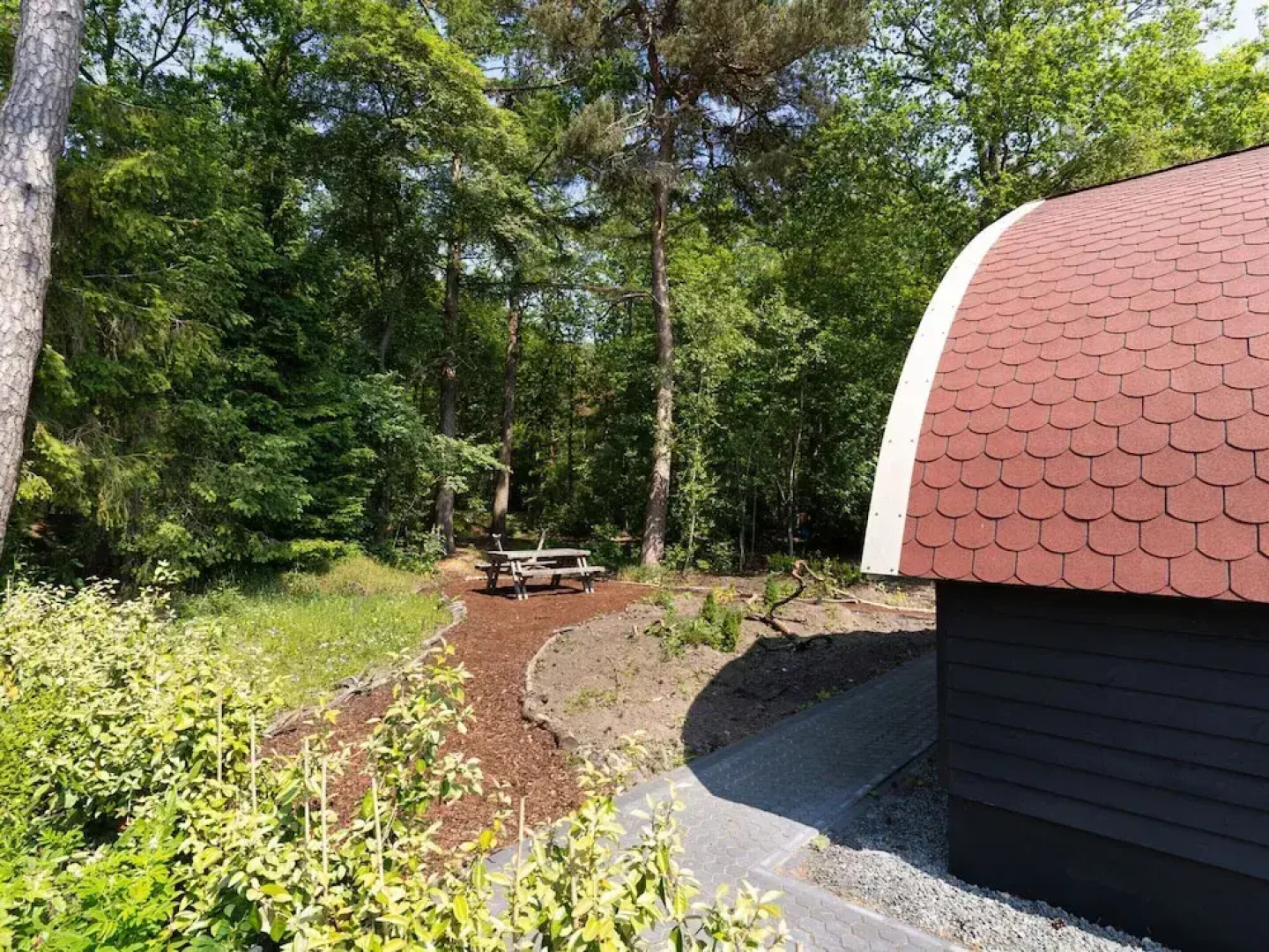House With a Terrace on the Edge of the Forest
