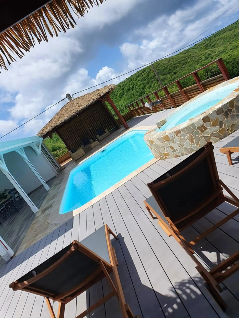 Villa de 4 chambres avec vue sur la mer piscine privee et jacuzzi a Le Marin a 3 km de la plage