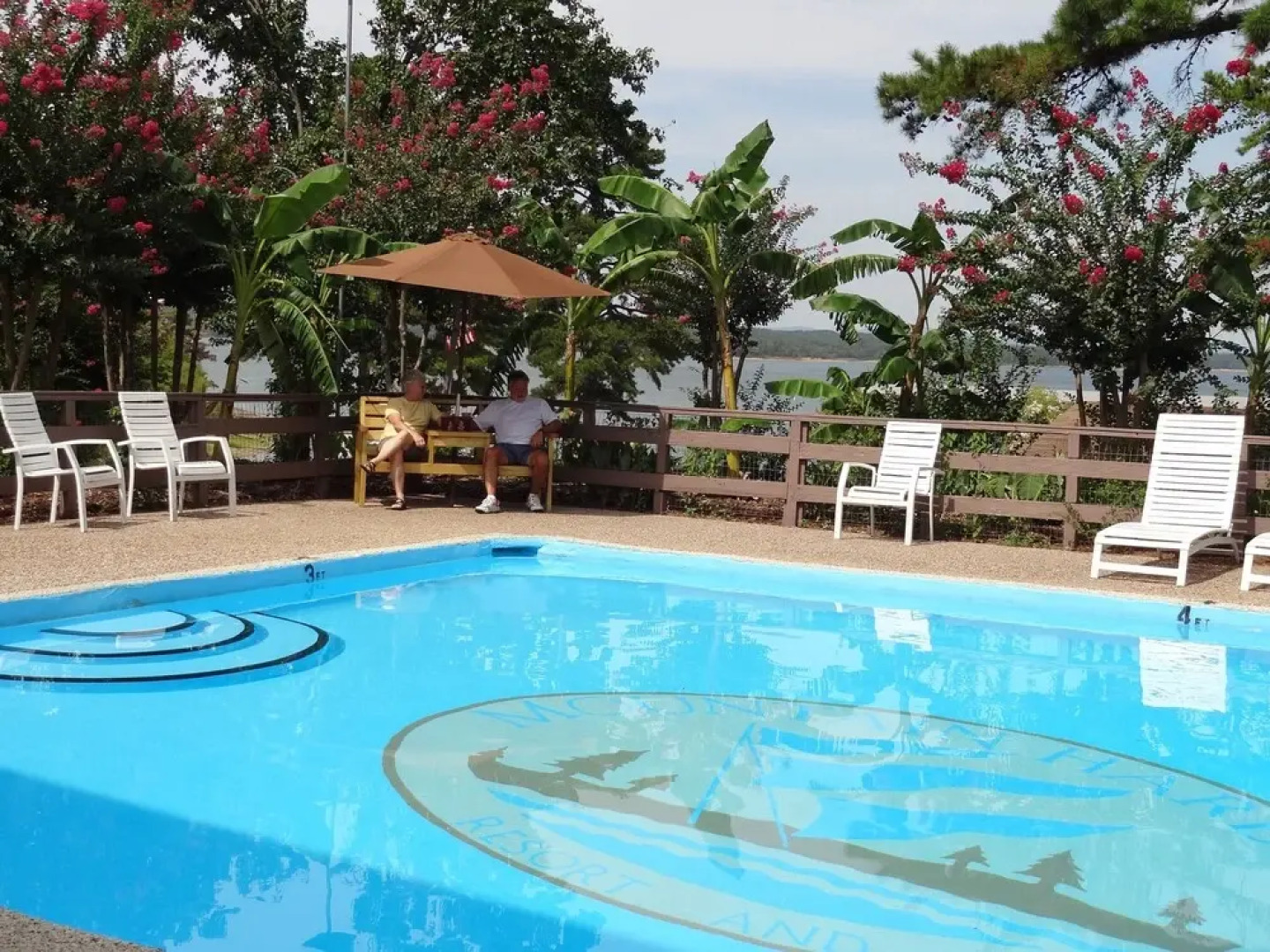 Poolside King Cabana with full kitchen, king bed, sleeper sofa and pool access. by RedAwning