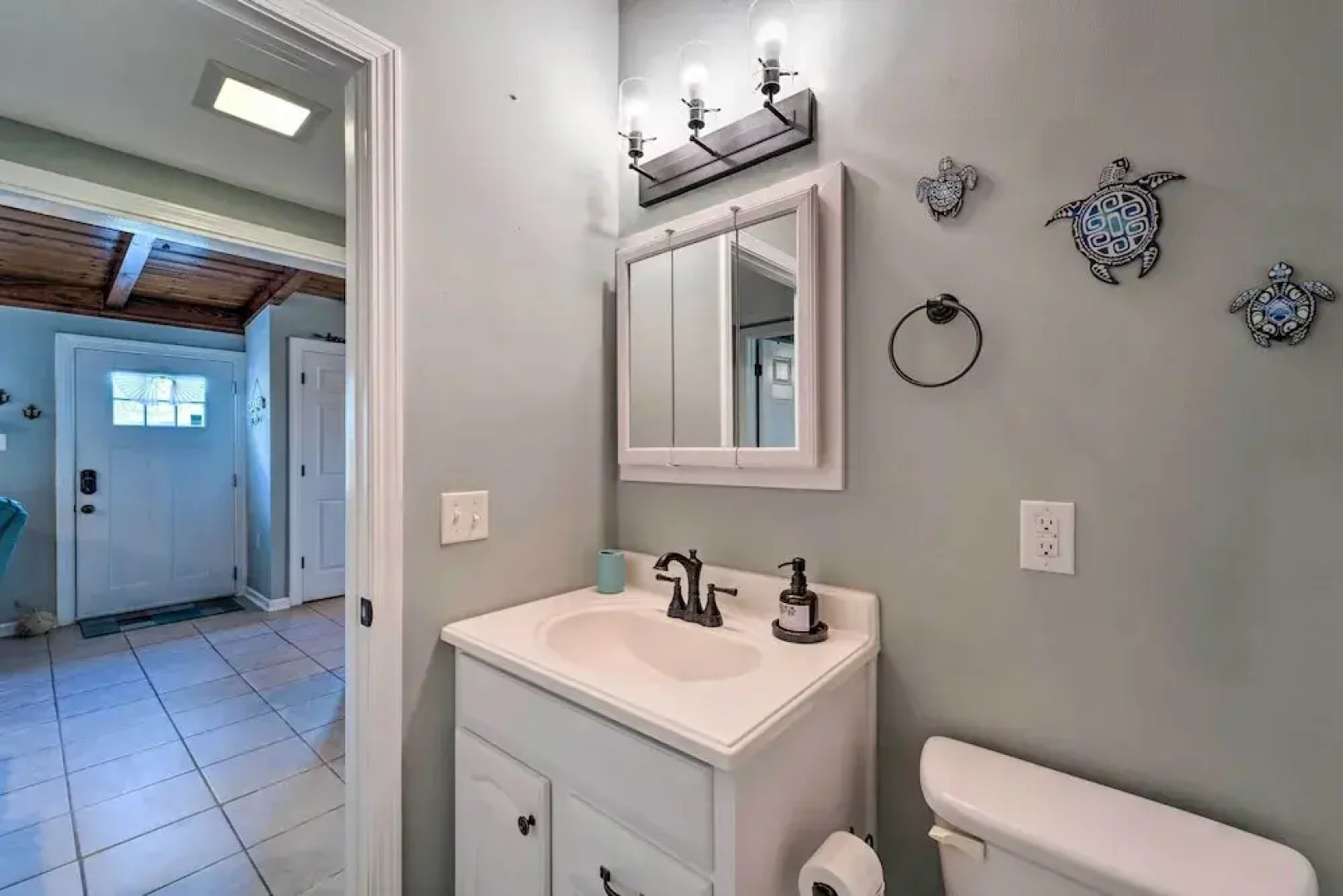 Updated Oak Island Getaway Near Fishing Dock!